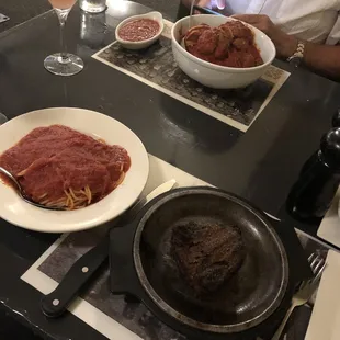 8 oz filet with spaghetti and spaghetti and meatballs and sausage.