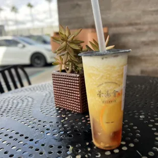 Pineapple fruit ice tea w/ tea jelly $6.25 (they blend the tea so it&apos;s kinda like a slushie)