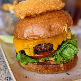 Burger. $19. 8 oz signature house ground beef, secret sauce, cheddar, brioche bun, French fries. Nineteen at TPC Sawgrass.