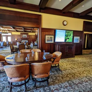 Inside. Dining room and bar with TVs. Nineteen restaurant, inside the TPC Sawgrass clubhouse.
