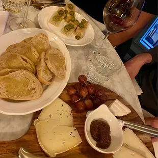 Focaccia in the back, cheese sampler with bread in the front