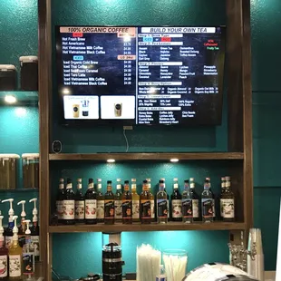 a bar with a variety of drinks