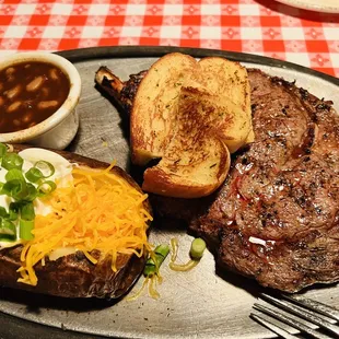 steak and baked potatoes