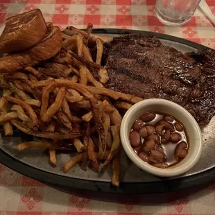 Ribeye with fries.