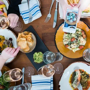 a group of people eating at a restaurant