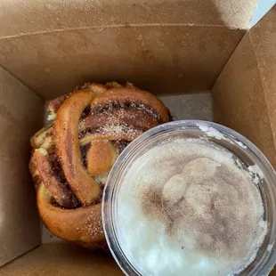 Twisted cinnamon roll (with cream cheese in a 2oz. condiment container for scale) $14