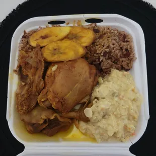 Rice and Beans, stew chicken, plantain and potato salad to go