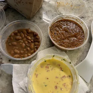 Side queso. Salsa and charro beans