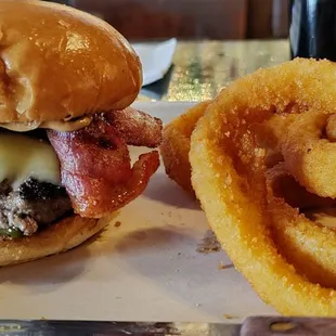 a burger and onion rings