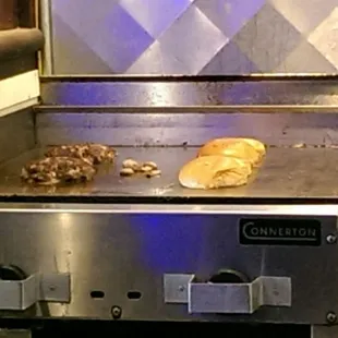 My first view after sitting down, hand formed burgers.