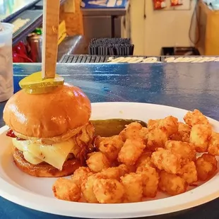 Peanut butter, bacon and jalapeño burger with tots. Awesome!