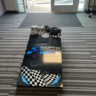 Play Corn hole while you wait.