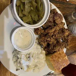 Chicken livers, green beans, mashed potatoes with milk gravy and corn bread