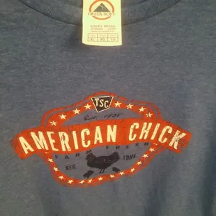 This shirt is actually a vibrant blue. My camera stinks. TSC carries clothes in &quot;tween&quot; size child XL. -E