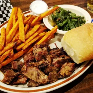 Burnt ends meal with sweet potato fries and green beans.