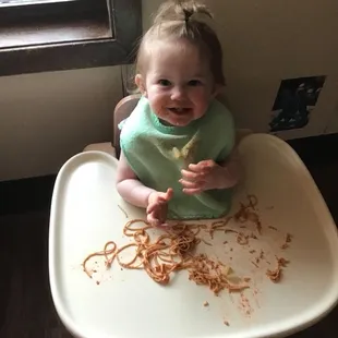 Just a little daily picture of our lil one eating at Tracy Kindercare.