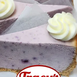 Blueberry Cheesecake by the slice with blueberry topping.