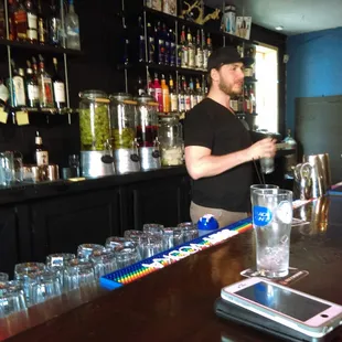 The handsome, friendly bartender