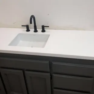 Vantiy remodel with cultured stone top. Call 559-755-4444 TradeKings Constructionfresno for all home remodel needs