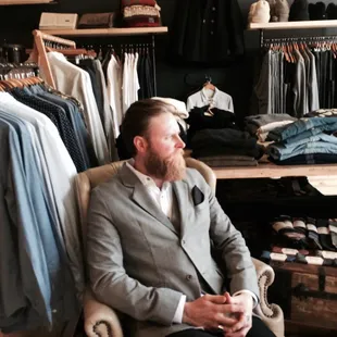 Hunter in a Barney's-quality herringbone suit by Eighteen Waits. Lightweight Japanese wool face the suit an elegant, custom fit.