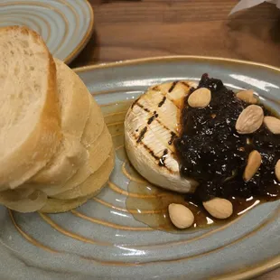 Baked brie w/ cranberry compote and marcona almonds. Melty and delish.