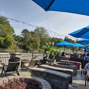 Sitting on the patio next to the river