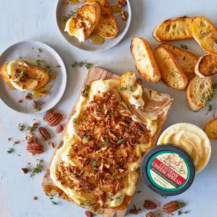 a spread of cheese and bread