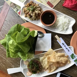 Delicious "Asian" fusion apps. Pictured: ahi poke and chicken lettuce wraps.