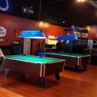 3 pool tables and a dart board