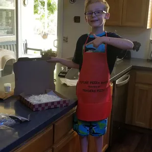 Traders Take n Bake future pizza maker making his first pie