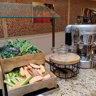 For a healthy option, a juicer with veggies pictured and fresh fruit including cranberries (love the cranberries).