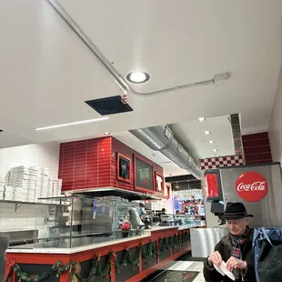 a man sitting at a table in a restaurant