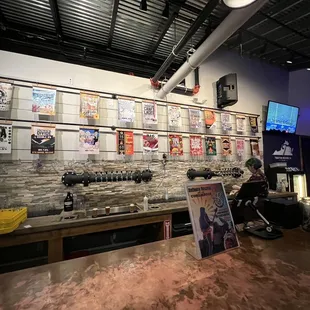 a bar with beer taps