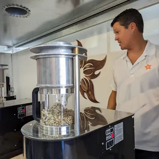 a man preparing coffee