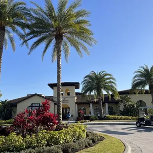 a golf cart parked in front of the resort