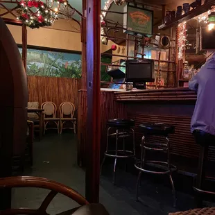 a man sitting at a bar