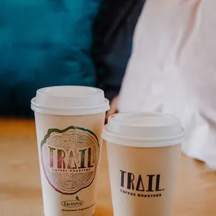 two cups of coffee on a table