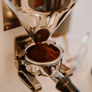a close up of a coffee grinder