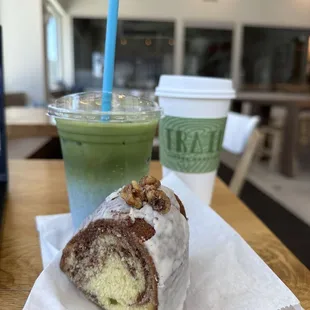 a piece of cake and a green smoothie