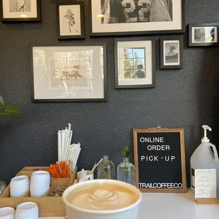 a person holding a cup of coffee