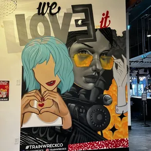 a mural of a woman with blue hair
