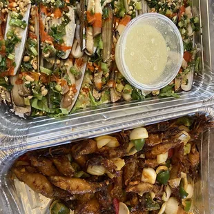 Part of $220 party platter: razor clams top, sweet squid bottom