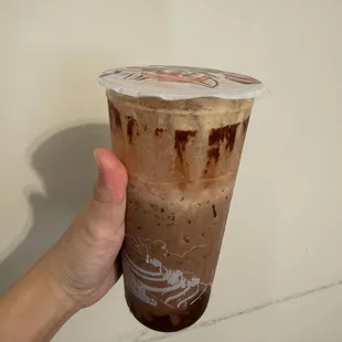 LARGE CACAO EGG COFFEE. half full tons of ice. You can see the where it is sealed.
