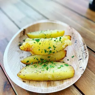 a plate of food on a wooden table