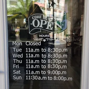 Hours on the front door