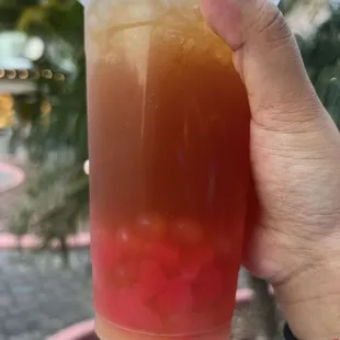Fruit tea with heart shaped strawberry jelly and mongo popping pearls.