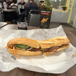 Pork bahn mi and Yellowtail Big Bold Red.
