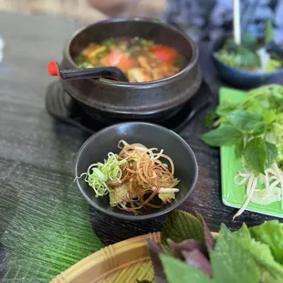 Small bowls provided to share dishes family style.