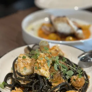 An amazing pasta dish! Tubular ink pasta that was very light and airy. Tons of seafood!