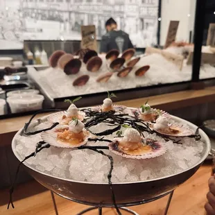 Oh, scallops are a must. Don't be shy  order the dozen.